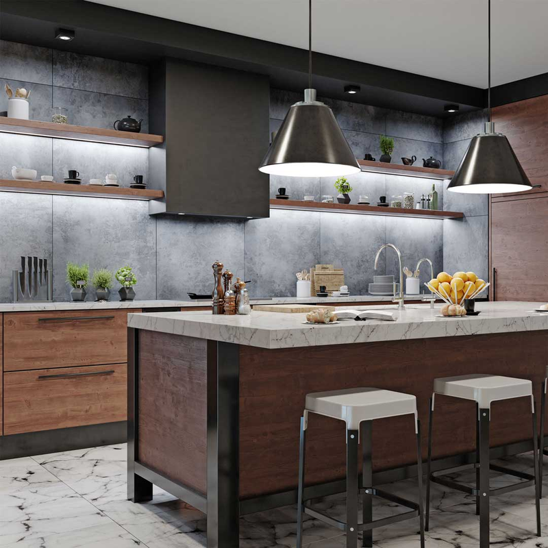 kitchen with lighting and gray walls and brown counter with bar stools